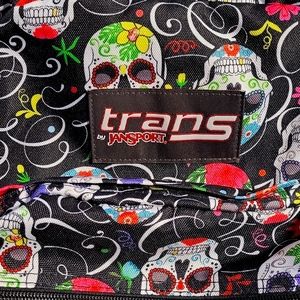 JANSPORT backpack, NWOT. Black w/ flowers & skull pattern